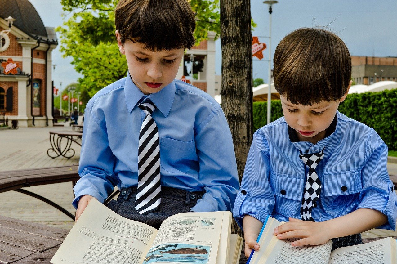 two boys reading